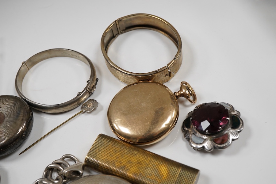 A quantity of assorted collectables, including a boxed Cartier handbag mirror, WWI medals, a plated belt, a Scottish silver and hardstone brooch, a silver hinged bangle, assorted costume jewellery, 925 bracelets, silver